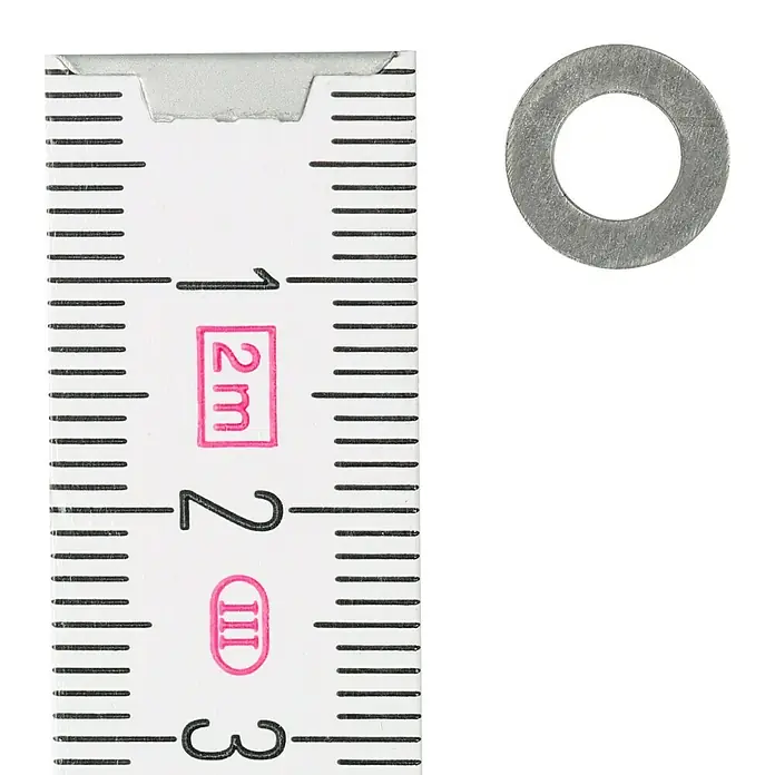 Profi Depot Unterlegscheibe A2 - Außendurchmesser: 10 mm, 100 Stk., Edelstahl - Nahaufnahme einer Unterlegscheibe neben einem Zollstock, der Einteilungen von 1 bis 3 Zentimetern anzeigt.