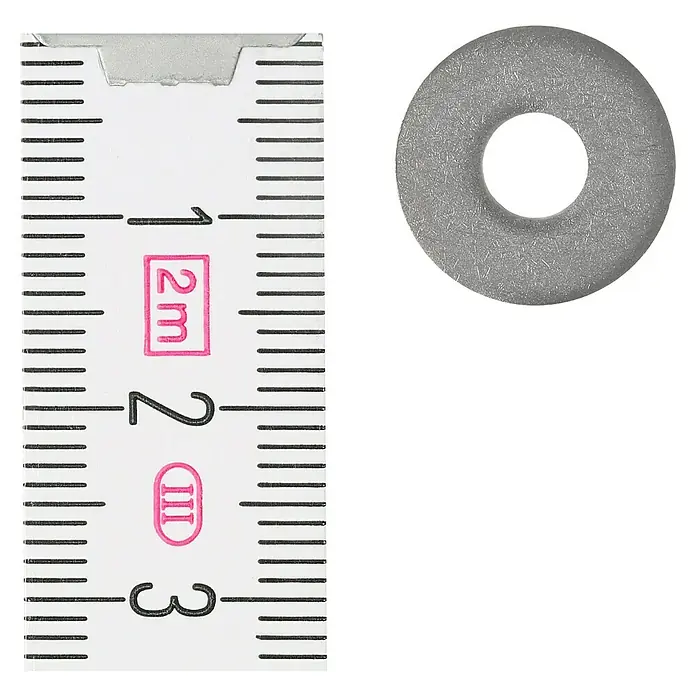 Profi Depot Bauscheibe A2 - Außendurchmesser: 15 mm, 100 Stk., Edelstahl - Nahaufnahme einer metrischen Unterlegscheibe neben einem Messlineal zur Größenbestimmung.