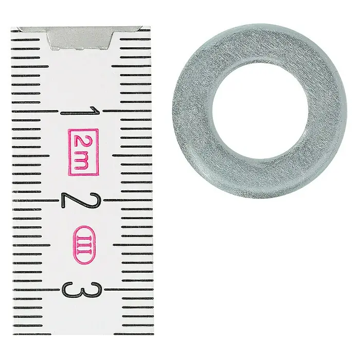 Profi Depot Unterlegscheibe - Innendurchmesser: 10,5 mm, Außendurchmesser: 20 mm, 100 Stk., Verzinkt - Nahaufnahme einer durchsichtigen Unterlegscheibe neben einem Messlineal zur Größenbestimmung.