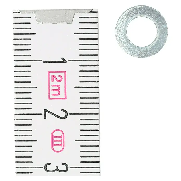 Profi Depot Unterlegscheibe - Innendurchmesser: 5,3 mm, Außendurchmesser: 10 mm, 100 Stk., Verzinkt - Nahaufnahme einer metrischen Messskala neben einer Unterlegscheibe, die Präzision und Messung in industriellen Anwendungen hervorhebt.