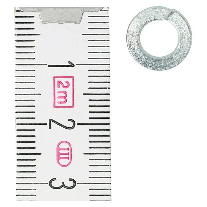 Profi Depot Federring - 6,1 mm, 100 Stk., DIN 127, Verzinkt - Nahaufnahme einer Unterlegscheibe neben einem Messstab, der eine Größe von ca. 23 mm anzeigt.
