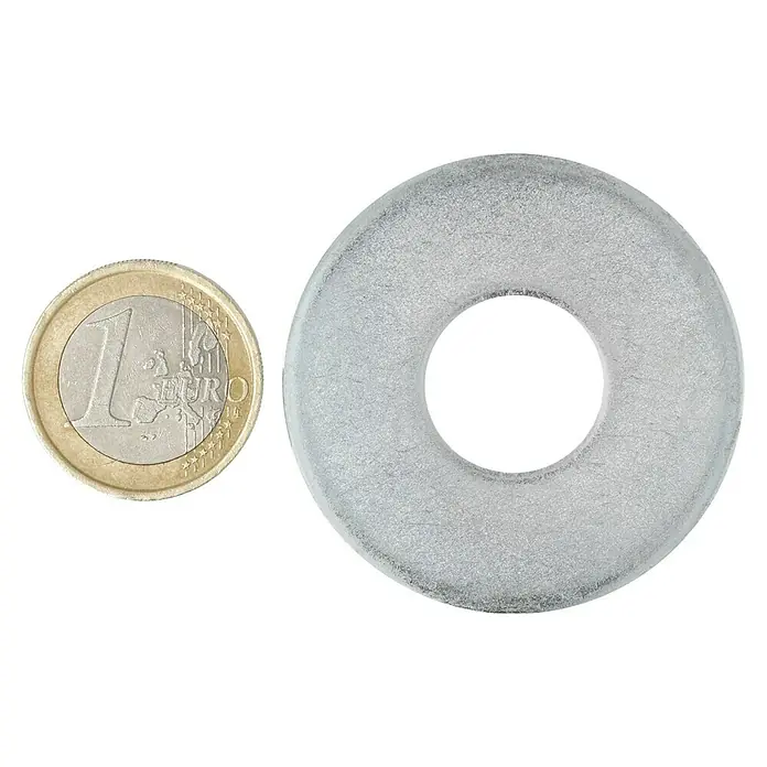 Profi Depot Arandela - Diámetro exterior: 44 mm, Acero, 50 ud., Diámetro interior: 15 milímetros (mm) - Un objeto transparente en forma de donut junto a una moneda de 1 euro, mostrando el tamaño y el material.