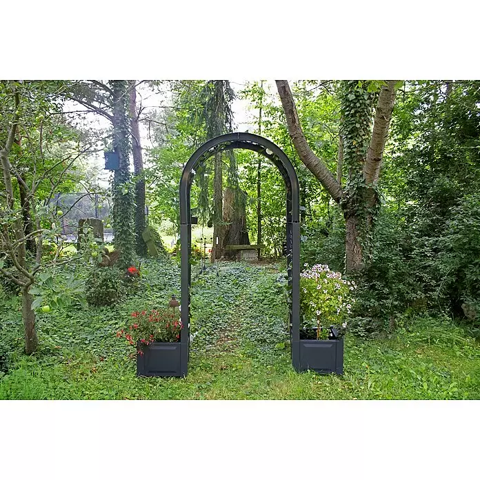 KHW Rosenbogen - Anthrazit, 174 x 43 x 207 cm, Ausstattung: 2 Pflanzkästen - Dunkelgrauer Metall-Gartenbogen mit integrierten Pflanzkästen und blühenden Pflanzen, in einem grünen Gartenweg.