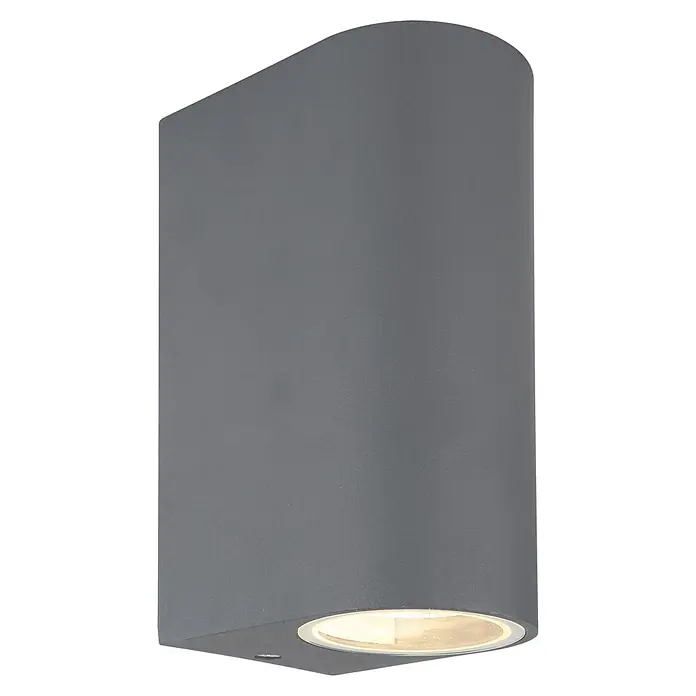 Globo Aplique exterior Veronika - 35 W, L x An x Al: 9,2 x 6,8 x 15 cm, Antracita, GU10, Redondeada - Primer plano de una lámpara de pared gris, que emite un brillo sutil y cálido. La lámpara presenta un diseño elegante y redondeado.