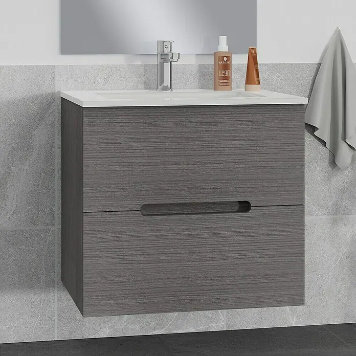 Artysan Mueble bajo de lavabo India Slim - L x An x Al: 39 x 60 x 54,5 cm, Ceniza - Un mueble de baño gris con dos cajones, un lavabo sobre encimera y un grifo sobre una pared gris. Una toalla cuelga cerca.