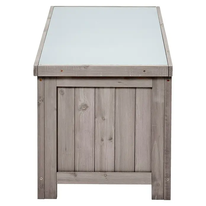 Butenkist Gartenbox Henriette - L x B x H: 75 x 45 x 45 cm, Holz, Warm Grey - Ein grauer Holzpflanzer mit einer hellen Oberfläche darauf. Er ist robust und ideal für den Garten.