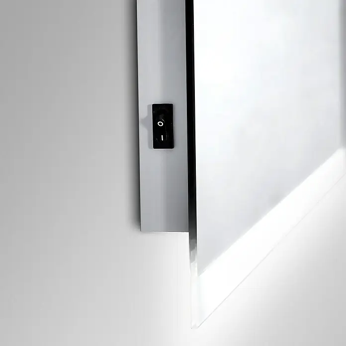 DSK Lichtspiegel Chrystal Grenier - 50 x 70 cm, Leuchtmittel - Detailaufnahme eines Lichtschalters an einer modernen, weißen Leuchte, ideal für minimalistische Raumgestaltung.