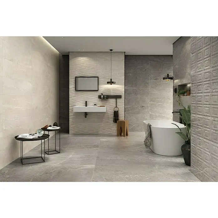 Halcón Revestimiento de pared Tempo Curve - 30 x 90 cm, Ceniza, Mate, Rectificado - Diseño de baño elegante con azulejos grises, una bañera exenta y accesorios modernos para un ambiente lujoso.