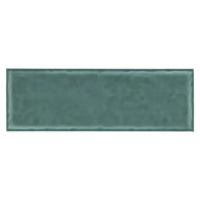 Modern Style Wandfliese Emotion Verde 800 - 9,8 x 29,8 cm, Grün, Glänzend - Das Bild zeigt eine einzelne, rechteckige, türkisfarbene Keramikfliese mit einer leicht unregelmäßigen Oberfläche.