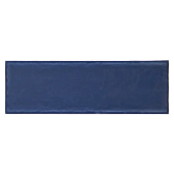 Modern Style Wandfliese Emotion Azul 780 - 9,8 x 29,8 cm, Dunkelblau, Glänzend - Marineblaue Keramikfliese mit glänzender Oberfläche und leicht unregelmäßigen Kanten, ideal für Wandverkleidungen in Küche oder Bad.