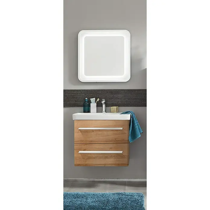 Badmöbel-Set MO60B1 - Gesamtbreite Badmöbel: 60 cm, Berg Eiche, Matt, 3 -tlg. - Modernes Badezimmer-Waschbecken mit Holzunterschrank und beleuchtetem Spiegel. Das Waschbecken ist stilvoll und funktional gestaltet.