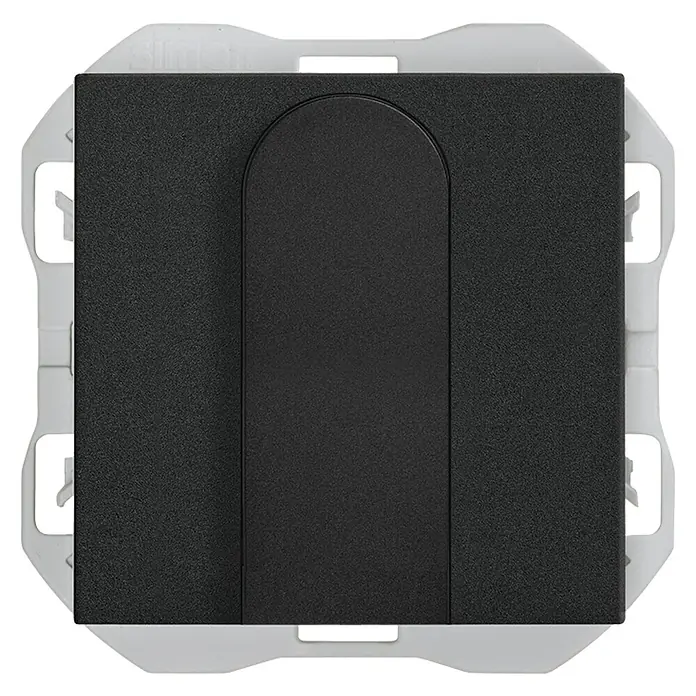 Simon 270 Tapa ciega - Negro, Mate, Plástico, Montaje en superficie - Primer plano de un interruptor de luz Simon negro con marco gris claro, combinando diseño moderno y funcionalidad.