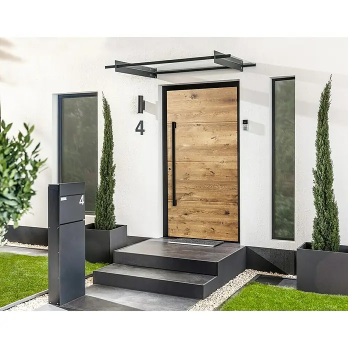 Portofino Blackline Edition Haustür 702PF Nero - 110 x 210 cm, DIN Anschlag: Links - Elegante Haustür aus Holz mit schwarzem Rahmen und Überdachung. Der Briefkasten in Anthrazit ergänzt das moderne Design des Hauseingangs.
