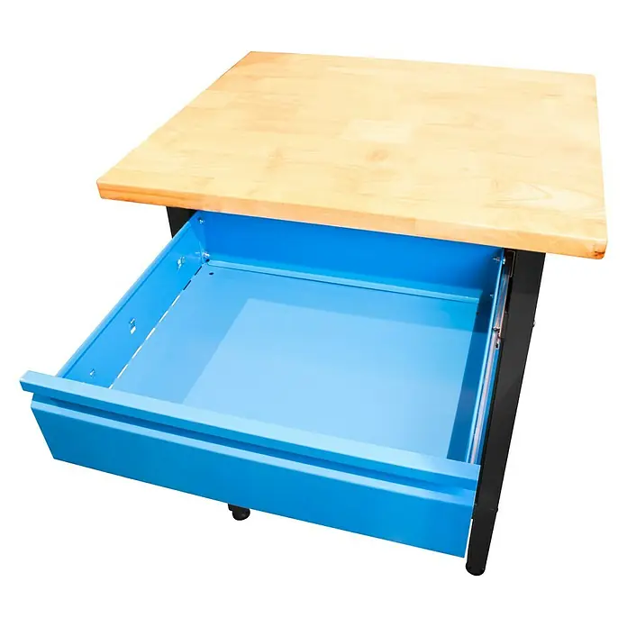 Güde Werkbank GW 1/1 S - L x B x H: 60 x 60 x 85 cm, Anzahl Schubladen: 1 Stk. - Nahaufnahme eines Werkstatttisches mit einer hellen Holzplatte und einer blauen Schublade, die teilweise geöffnet ist.