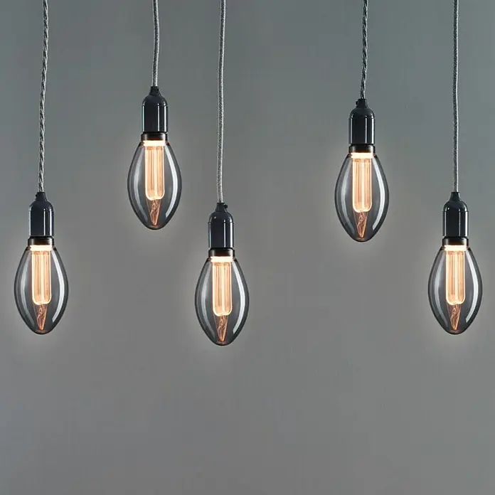 Paulmann Inner Glow LED-Lampe Vintage Glühlampenform E27 - E27, Nicht Dimmbar, Gelb, 80 lm, 3,5 W, Kerze, Farbe: Smoky - Fünf hängende Glühbirnen mit grauem Kabel und länglicher, abgerundeter Form erzeugen ein warmes Licht und sind ein dekoratives Element.