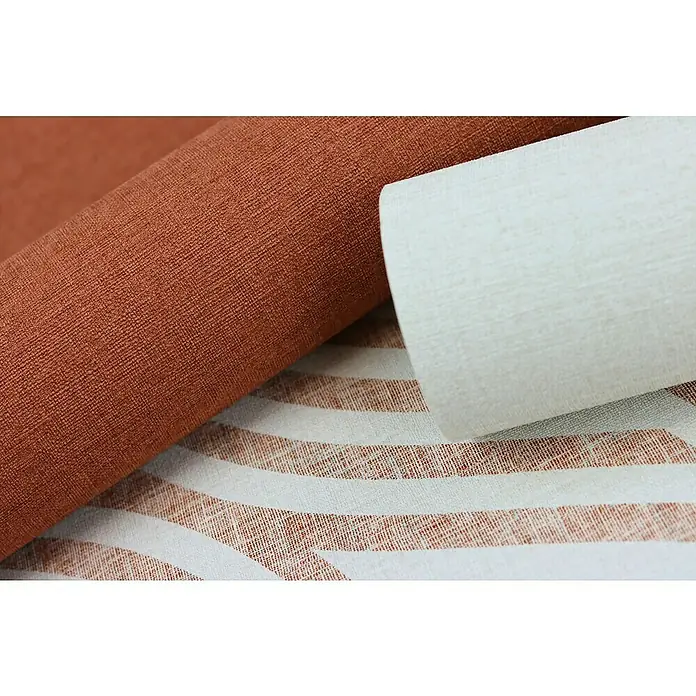 Rasch Salsa Vliestapete - Beige, Uni, 10,05 x 0,53 m - Eine Nahaufnahme von strukturierten Stoffen in Rostrot und Weiß, die eine dekorative Vielseitigkeit für Designprojekte bieten.