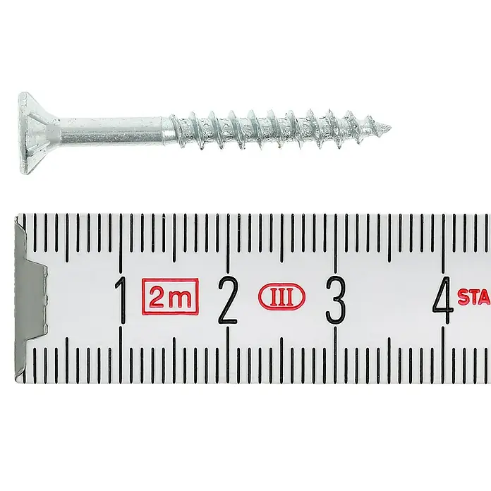 Profi Depot Spanplattenschraube VZ - Ø x L: 4 x 35 mm, 1.000 Stk., Verzinkt - Nahaufnahme einer Holzschraube neben einem Messband, das etwa 3,5 cm anzeigt.