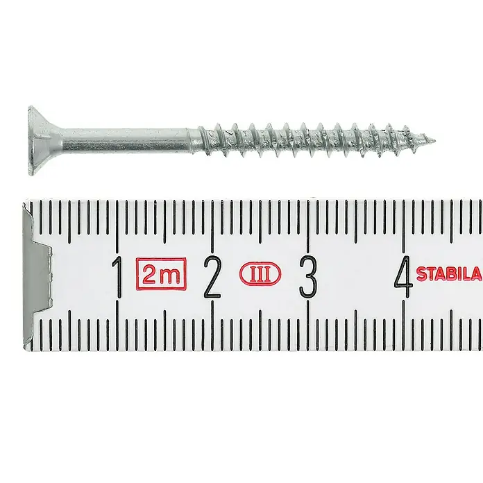 Profi Depot Spanplattenschraube VZ - Ø x L: 4 x 45 mm, 500 Stk., Verzinkt - Ein silberner Senkkopfschraube liegt neben einem Zollstock, der etwa 3,8 cm anzeigt.