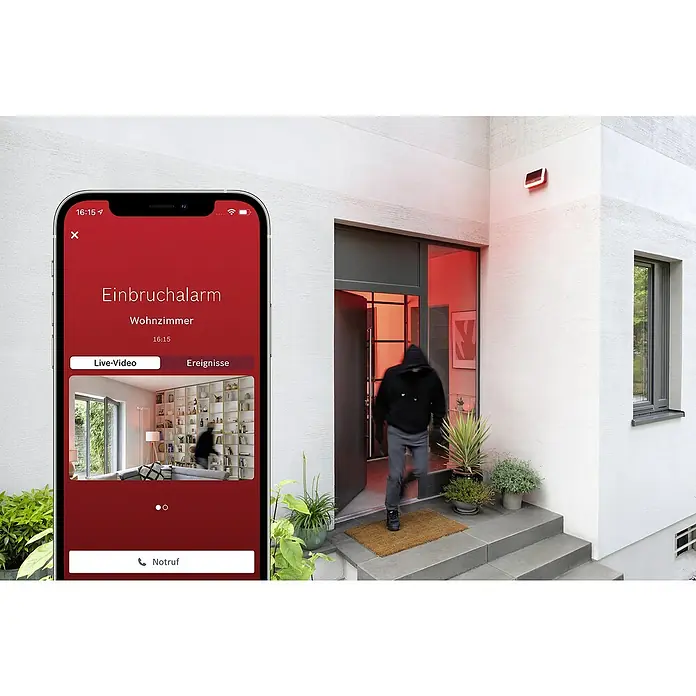 Bosch Smart Home Außensirene - 100 dB - Alarmanlage in Aktion: Einbrecher wird vom System erfasst. Smartphone-App zeigt Live-Video und löst Einbruchalarm aus. Wohnzimmerüberwachung.