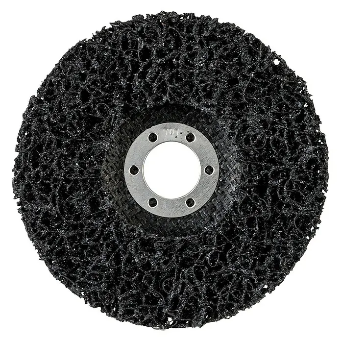 Craftomat Disco de limpieza - 1 ud. - Primer plano de un disco de limpieza negro con un inserto metálico en el centro para trabajos de rectificado.