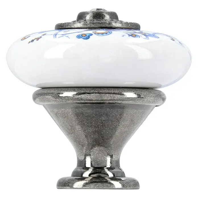 Siro Möbelknopf - Typ Möbelgriff: Knopf, Sonstige, Sonstige, Breite: 32 mm - Nahaufnahme eines Porzellan-Möbelknopfs mit floralen Verzierungen und Metallsockel, der eine elegante Note verleiht.