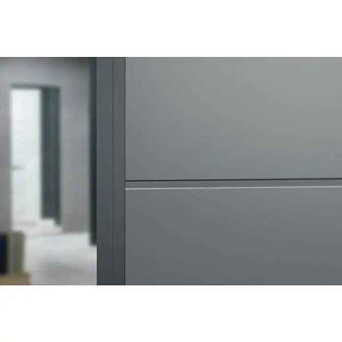 GetaDoor Lamineo Zimmertür GLN 747 - 860 x 1.985 mm, DIN Anschlag: Links, Staubgrau, Röhrenspan - Elegantes graues Möbelstück mit minimalistischem Design und klaren Linien, ideal für moderne Innenräume.