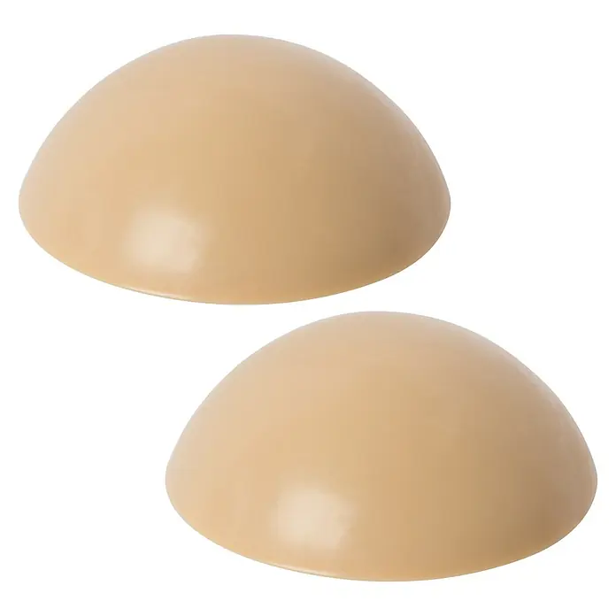 Walteco Türstopper - Ø x H: 30 x 12 mm, Beige, 2 Stk. - Abbildung von zwei hautfarbenen BH-Einsätzen aus Silikon, die für einen zusätzlichen Halt und eine natürliche Form sorgen.