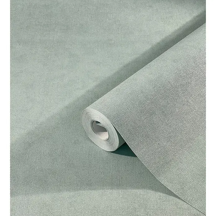 Marburg Kids' Walls Vliestapete schattiert - Türkis, Uni, 10,05 x 0,53 m - Nahaufnahme einer Rolle strukturierten, mintgrünen Vliestapete, die eine textile Oberfläche für ein modernes Wohnambiente zeigt.