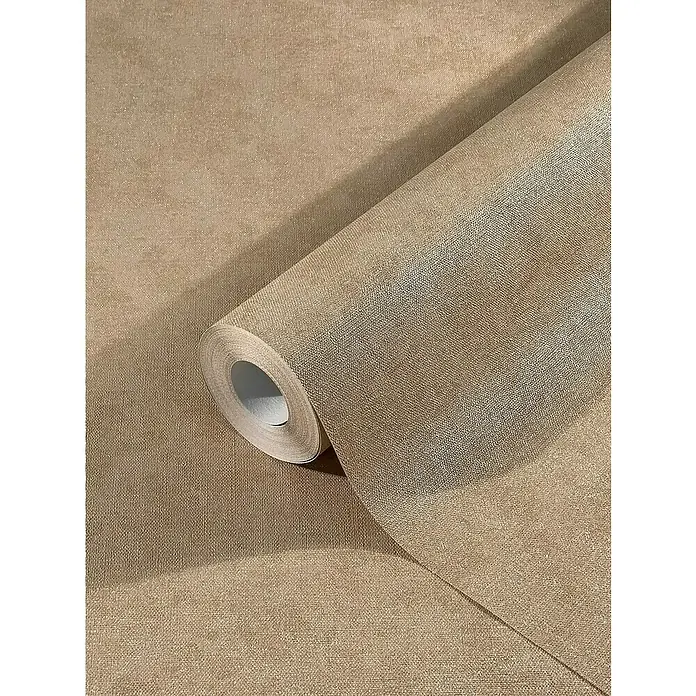 Marburg Kids' Walls Vliestapete schattiert - Beigebraun, Uni, 10,05 x 0,53 m - Nahaufnahme einer Rolle strukturierten, beigen Vinyltapete, die für die Wanddekoration im Innenbereich geeignet ist.