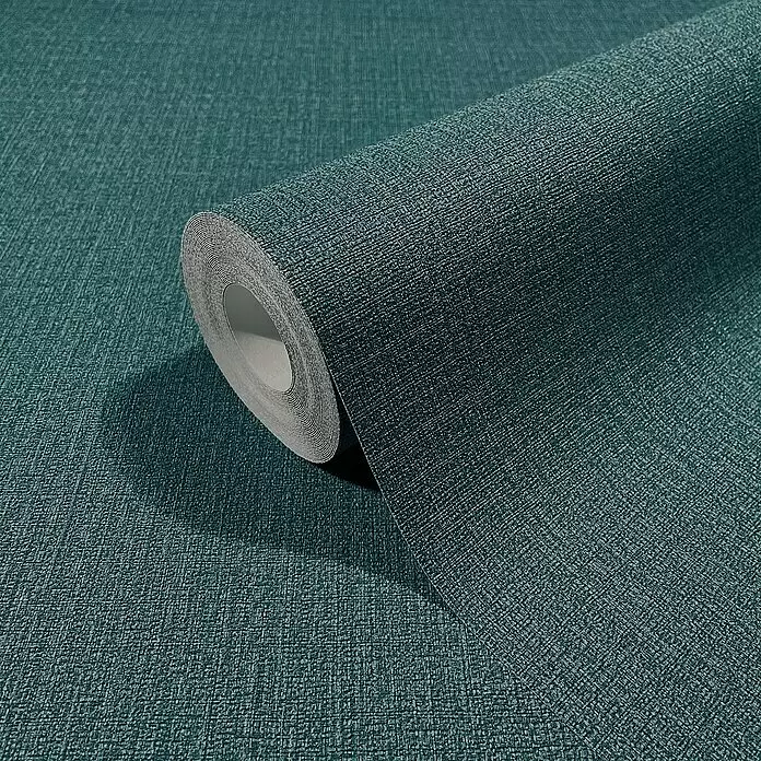 Marburg Papis Loveday Vliestapete - Blau/Türkis, Uni, 10,05 x 0,7 m - Rolle strukturierter türkiser Tapete mit Leinenbindung, teilweise abgerollt.