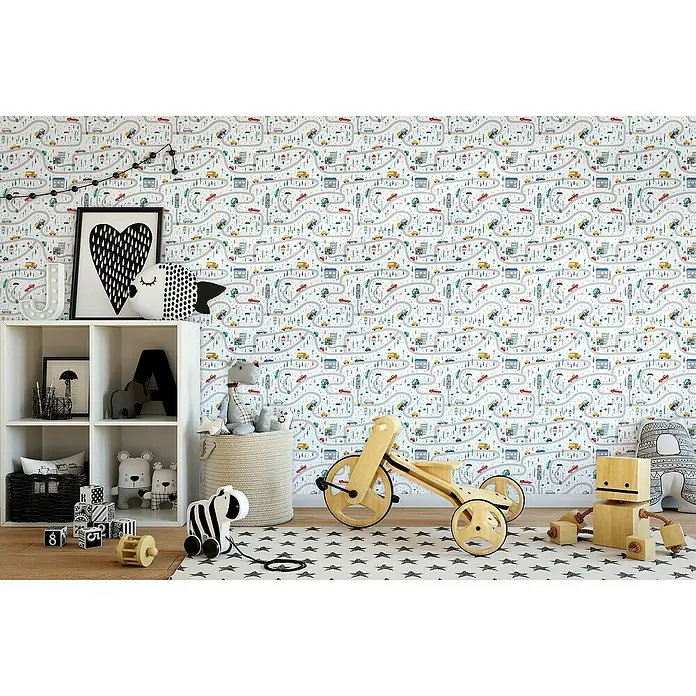 Marburg Kids' Walls Vliestapete Straßenführung - Weiß/Multicolor, Grafisch, 10,05 x 0,53 m - Ein Kinderzimmer mit einer weißen Regaleinheit voller Spielsachen und einem farbenfrohen Wanddesign, das die Fantasie anregt.