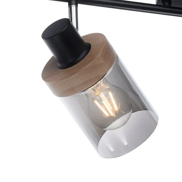 Just Light Deckenstrahler Pasqual - 80 W, L x B x H: 64 x 30 x 24 cm, Schwarz, E27 - Nahaufnahme einer modernen Deckenleuchte mit Glaskörper, Holzdetails und einer Edison-Glühbirne.