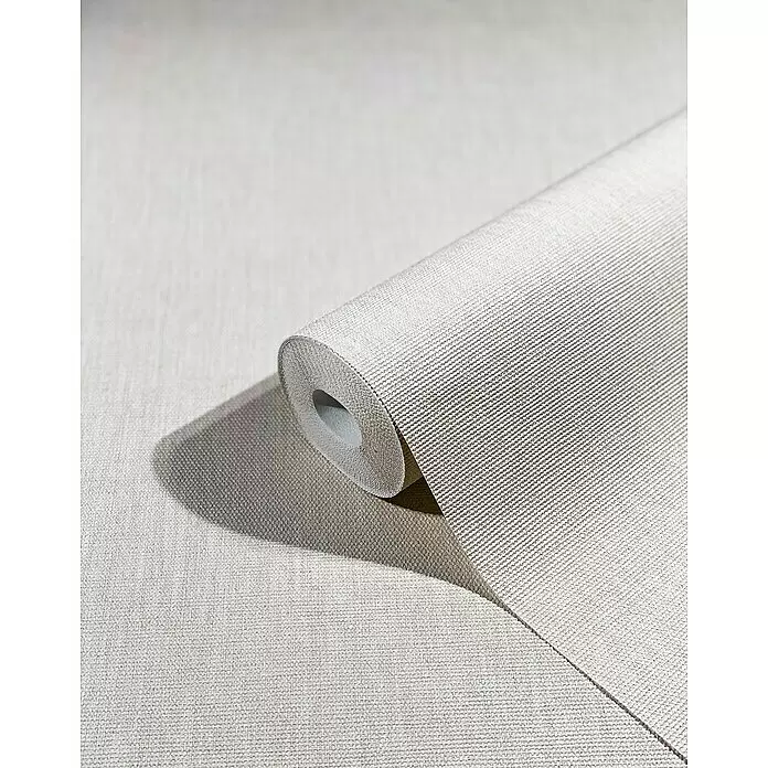 Marburg Botanica Vliestapete Struktur - Hellbeige, Uni, 10,05 x 0,53 m - Teilweise abgerollte Rolle heller beiger Tapete mit strukturierter, gewebter Oberfläche.