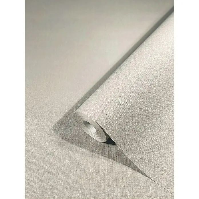 Marburg Kids' Walls Vliestapete - Beige, Uni, 10,05 x 0,53 m - Nahaufnahme einer Rolle hellgrauer, strukturierter Tapete, die eine subtile und elegante Wandgestaltung verspricht.