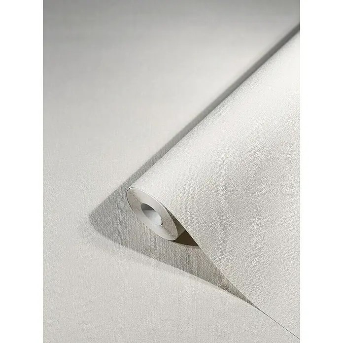 Marburg Kids' Walls Vliestapete - Greige, Uni, 10,05 x 0,53 m - Nahaufnahme einer weißen Tapetenrolle mit leichter Textur und subtilem Schattenwurf, ideal für minimalistische Raumgestaltung.