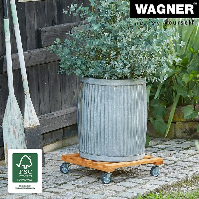Wagner System Pflanzenroller - 9,5 x 38 cm, Hellbraun, Max. Belastung: 120 kg, Durchmesser Rolle: 50 mm - Pflanzroller mit einer großen Pflanze drauf, ideal für den Garten oder die Terrasse.