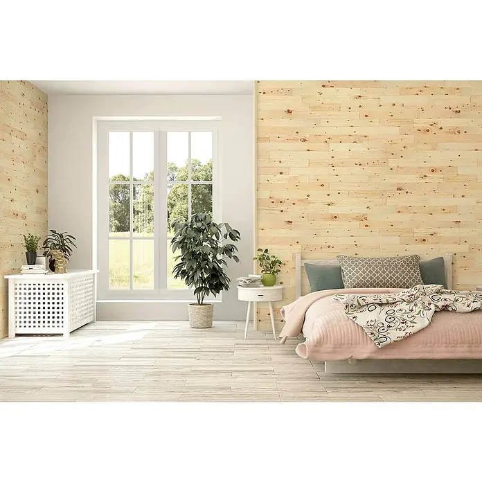 Wodewa Holzriemchen 1000 Zirbe - 1.000 x 100 mm, Stärke: 3 mm - 6 mm, 10 Stk., 1 m², Selbsklebend - Helles Schlafzimmer mit einem Bett, Holzpaneelen an den Wänden und Zimmerpflanzen, das eine gemütliche und natürliche Atmosphäre schafft.