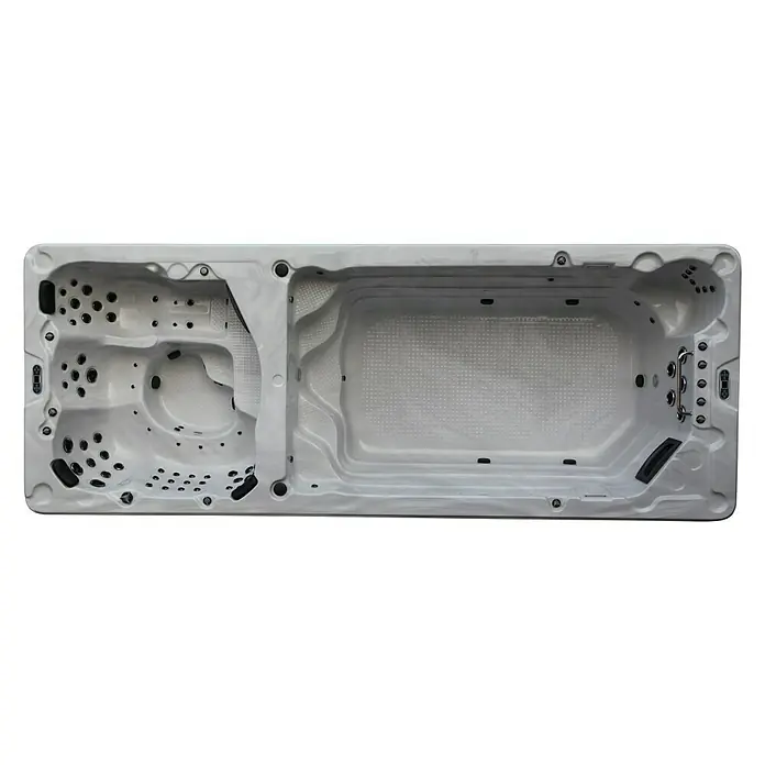 Camargue Hidromasaje para exterior SwimSpa II - 594 x 228 x 137 cm, Gris/Blanco/Marrón, Número de personas máx.: 10 - Vista superior de un swim spa rectangular con zona de hidromasaje, ideal para relajación y fitness en el jardín.