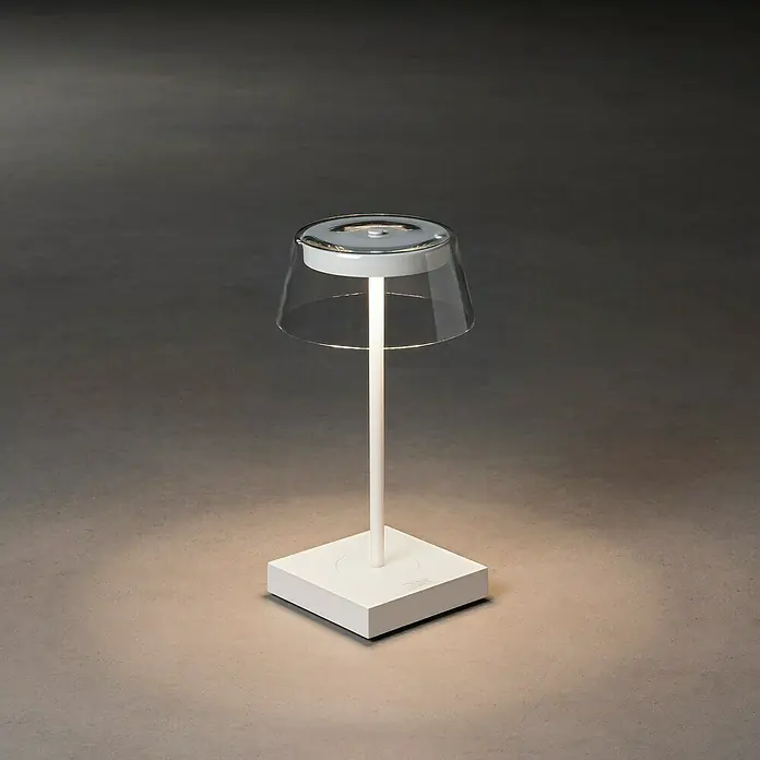 Konstsmide Akku-Tischleuchte Scilla - 2,5 W, L x B x H: 11 x 11 x 27 cm, Weiß, Warmweiß - Elegante Tischleuchte mit transparentem Schirm und weißem Sockel. Das moderne Design sorgt für eine angenehme Beleuchtung in jedem Raum.
