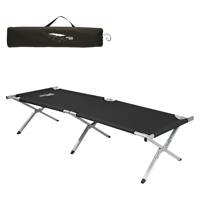 Aktive Tumbona de camping - Negro - Cama de camping negra Aktive con estructura plateada, plegada y empaquetada en una bolsa de transporte para facilitar su transporte.