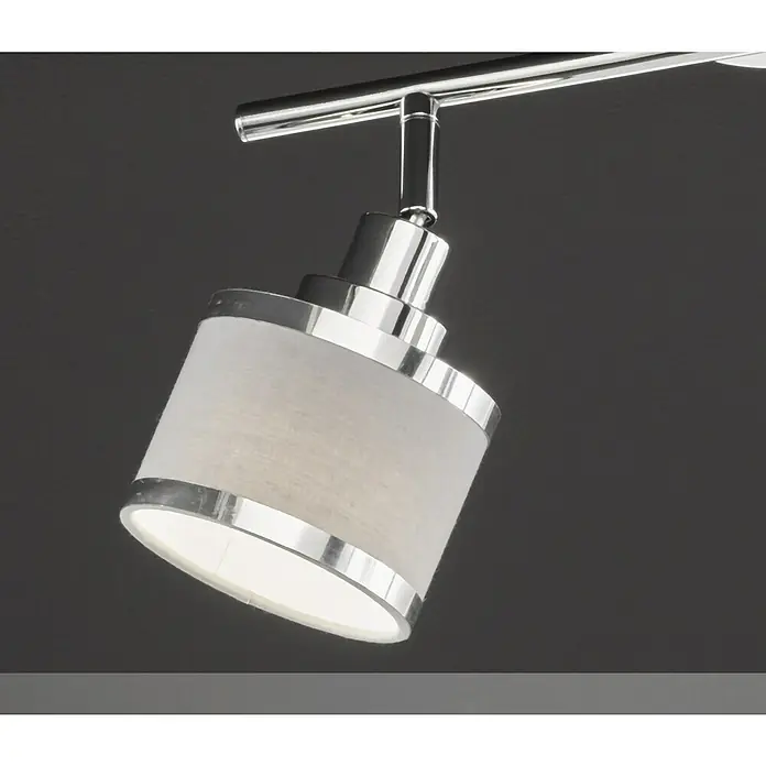 WOFI Wandstrahler Alexia - 56 W, L x B x H: 36,5 x 10 x 21,5 cm, Chrom, E14, 2 Stk. - Nahaufnahme einer modernen Chrom-Lampe mit zylindrischem Lampenschirm, die ein warmes Licht ausstrahlt.