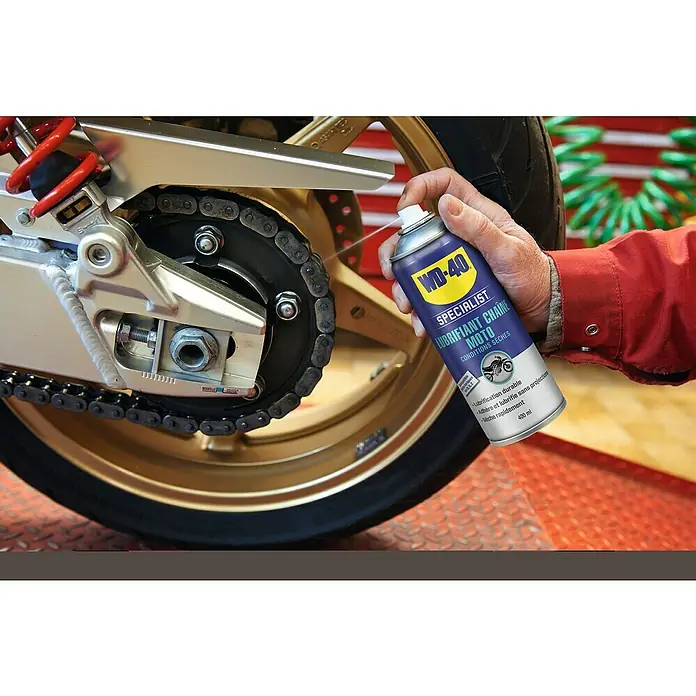 WD-40 Specialist Motorbike Aceite para cadena - 400 ml - WD-40 Specialist Lubricante de Cadena MOTO para condiciones secas aplicado a una cadena de moto para mejorar la lubricación.