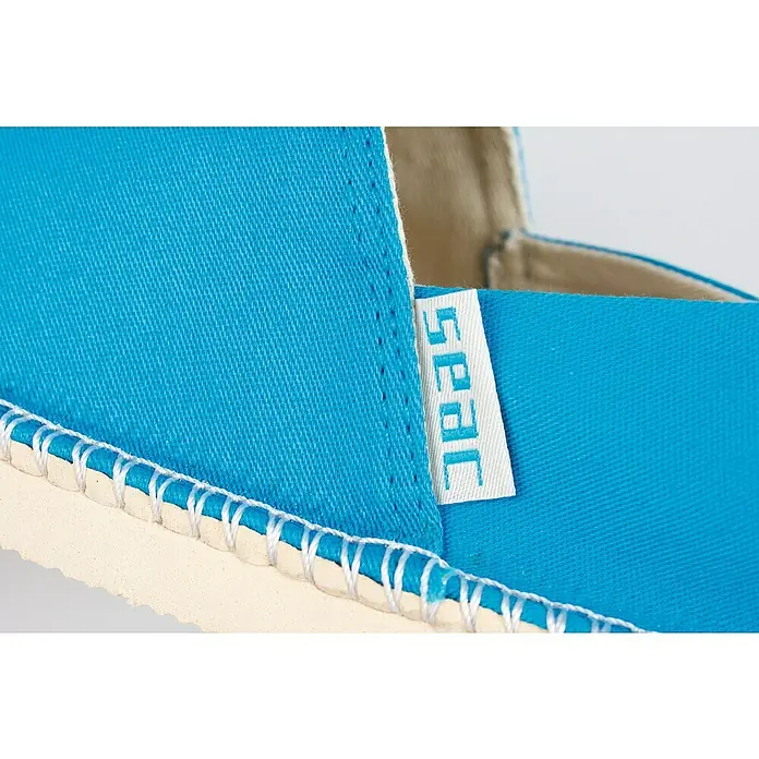 Seac Sub Náutico Málaga - 44, Textil, Azul - Primer plano de una alpargata turquesa con suela de yute y una etiqueta de tela blanca.