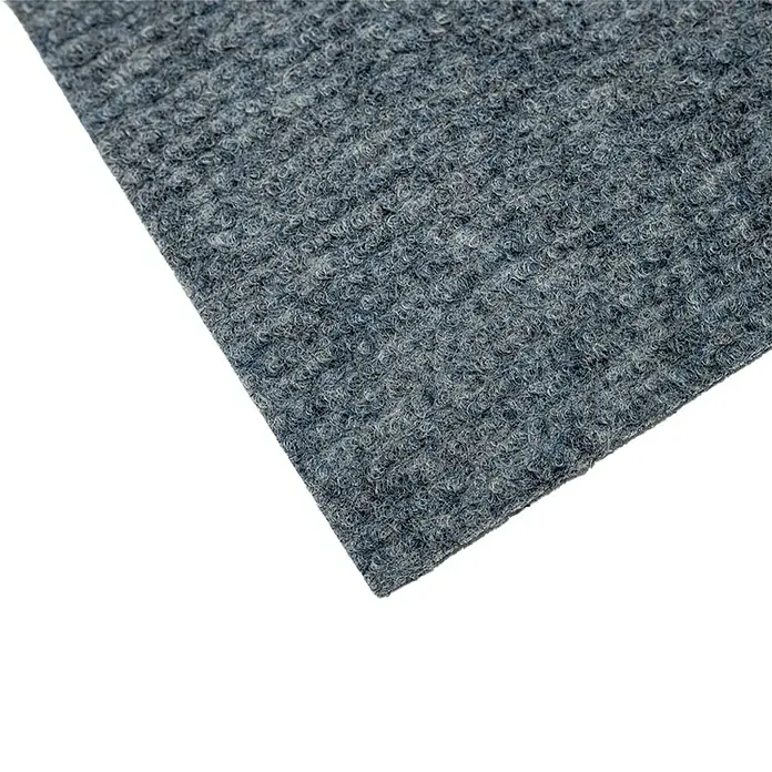 Moqueta a metros Rizada - Ancho: 200 cm, 100% Poliéter sulfona, Azul - Primer plano de una alfombra gris, destacando la textura y los detalles finos del material. Ideal para proyectos textiles o de diseño.
