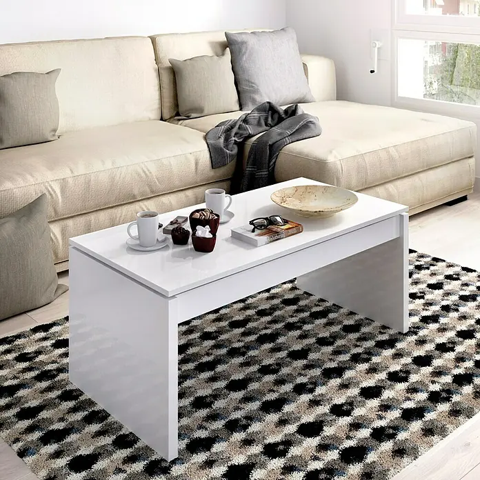 Dekit Mesa auxiliar de jardín Side - L x An x Al: 50 x 100 x 43 cm, Blanco - Esta imagen muestra una mesa de centro blanca y moderna con elementos decorativos, sobre una alfombra estampada delante de un sofá beige.