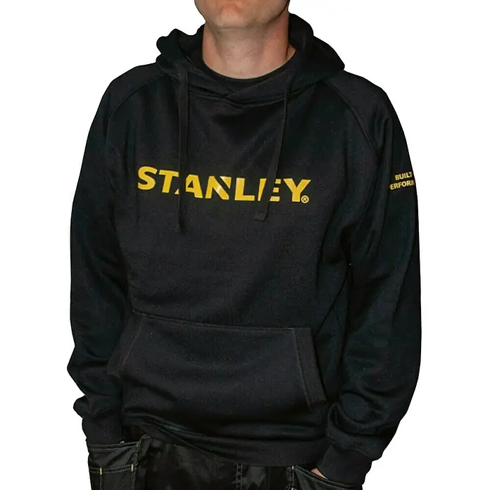 Stanley Sudadera con capucha Montana - XL, Negro/Amarillo - Sudadera negra con capucha y el logo amarillo de STANLEY. Una prenda cómoda y práctica con el logotipo de la marca visible.
