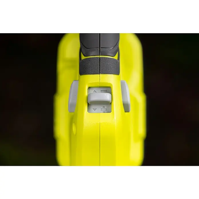 Ryobi ONE+ Akku-Bodenhacke RY18CVA-0 - Ohne Akku, Li-Ionen, 18 V - Nahaufnahme eines gelben Geräts mit einem grauen Schalter, der mit Symbolen zur Einstellung der Leistung versehen ist.