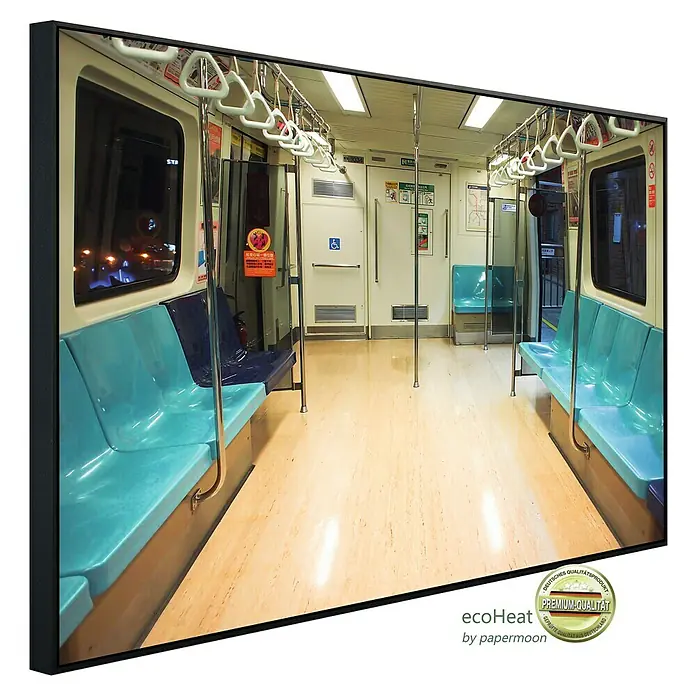 Papermoon Infrarot-Bildheizkörper Leere U-Bahn - 100 cm x 600 mm, 600 W - ecoHeat by papermoon: Innenansicht einer leeren U-Bahn mit hellblauen Sitzen und Haltegriffen, präsentiert als hochwertiges Wandbild.