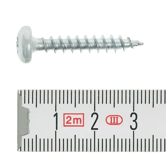 Profi Depot Spanplattenschraube VZ - 5 x 30 mm, 200 Stk., Verzinkt, TX für TORX-Antriebe - Nahaufnahme einer Schraube neben einem Messband, das 3 cm anzeigt.
