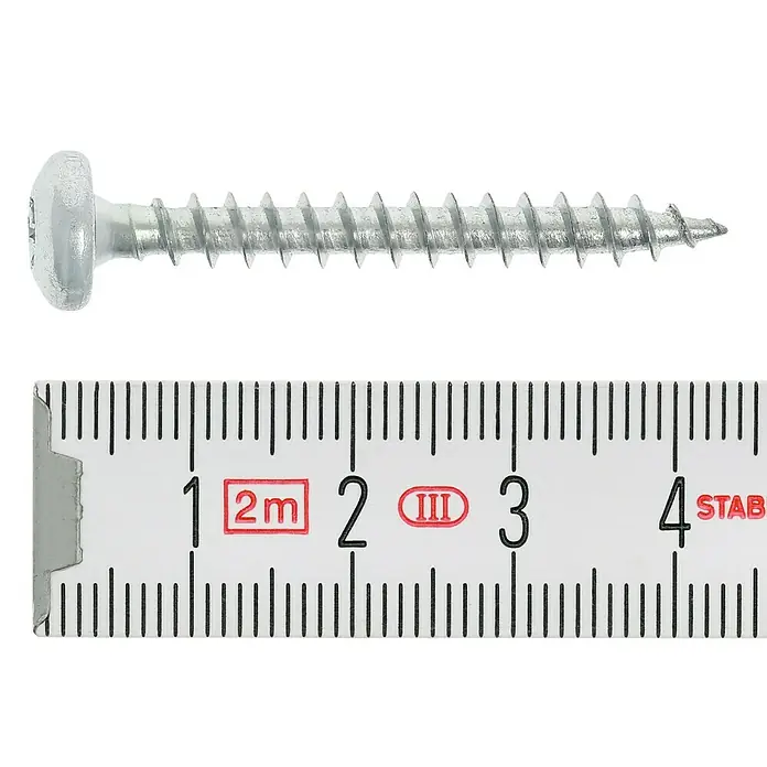 Profi Depot Spanplattenschraube VZ - 5 x 40 mm, 100 Stk., Verzinkt, TX für TORX-Antriebe - Nahaufnahme einer 3 cm langen, silbernen Linsenkopfschraube neben einem Messlineal.